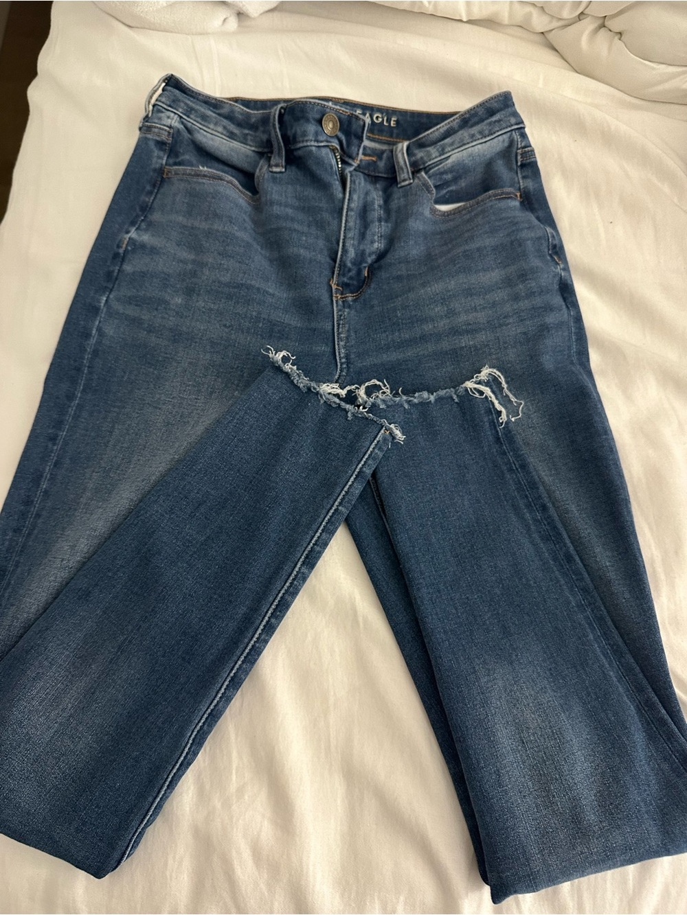 American Eagle Outfitters  Dark Blue Distressed “the dream jean”